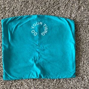 teal tube top from Target says “do your thing”